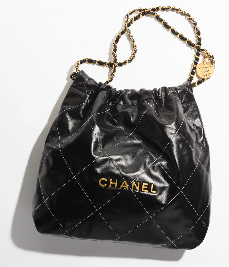 CHANEL 22 HANDBAG Shiny Calfskin & Gold-Tone Metal Black & White CHANEL 22 HANDBAG Shiny Calfskin & Gold-Tone Metal Black & White