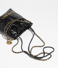 Chanel 22 Small Handbag Shiny Calfskin AS3260 Black Gold with White logo in  2023